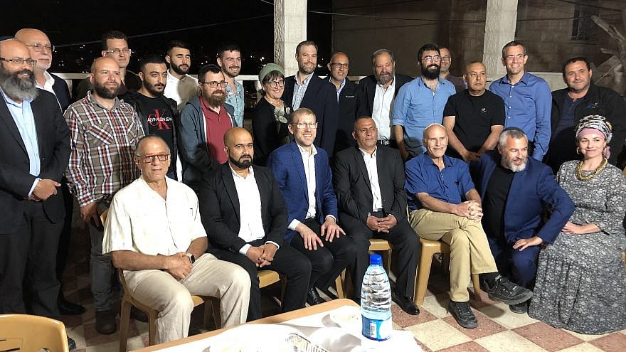 Guests at an Iftar gathering attended by Jews and Arabs, hosted by Palestinian businessman Ashraf Jabari in Hebron, April 2021. Photo by Josh Hasten.