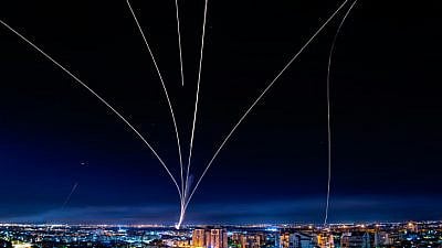 A long-exposure shot showing Israel's Iron Dome defense system firing interceptors at rockets fired from the Gaza Strip, May 16, 2021. Photo by Avi Roccah/Flash90.
