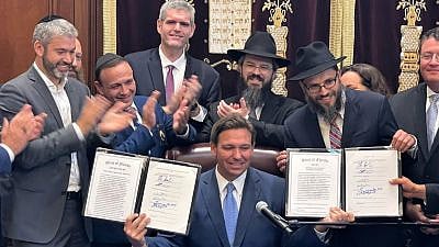 Florida Gov. Ron DeSantis signed legislation that adds funding for Jewish causes and supports Hatzalah emergency-service workers, June 17, 2021. Source: Hatzalah of South Florida/Twitter.