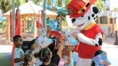 A “Paw Patrol” character visited children at kindergartens in Jaffa, Israel, signing autographs and handing out toys, June 8, 2021. Photo by Chen Shenhav.