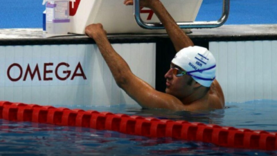 Iyad Shalabi in the pool, shortly after winning the gold medal in the 100-meter backstroke final. Credit: Isaacson Foundation.