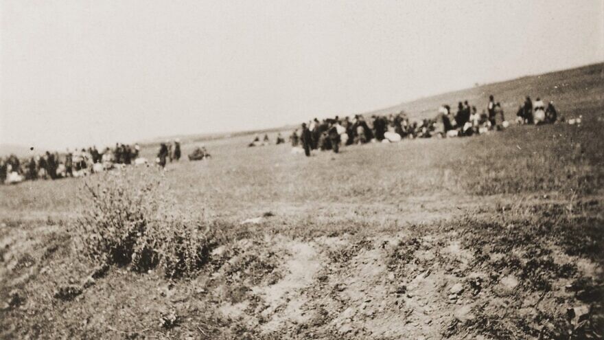 Jews at the killing site outside of Kamenets-Podolsk, a city in western Ukraine, in late August 1941. Credit: United States Holocaust Memorial Museum Photo Archives, Courtesy of Ivan Sved.