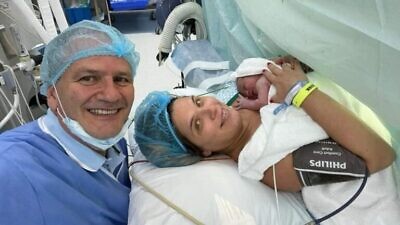 Israeli head of mission in Dubai Ilan Sztulman and wife Jacqueline with their newborn daughter, Mia, on Aug. 14, 2021. Photo courtesy of Israeli Foreign Ministry.