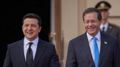 Ukrainian President Volodymyr Zelenskyy greets Israel’s President Isaac Herzog upon his arrival to Ukraine, in part to address an international gathering marking 80 years since the Babi Yar massacre, Oct. 5, 2021. Source: Isaac Herzog/Twitter.