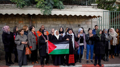 Palestinians protest outside the U.S. Consulate General's cultural center in eastern Jerusalem against President Donald Trump's announcement that the United States was recognizing Jerusalem as Israel's capital, Dec. 7, 2017. Photo by Sliman Khader/Flash90.