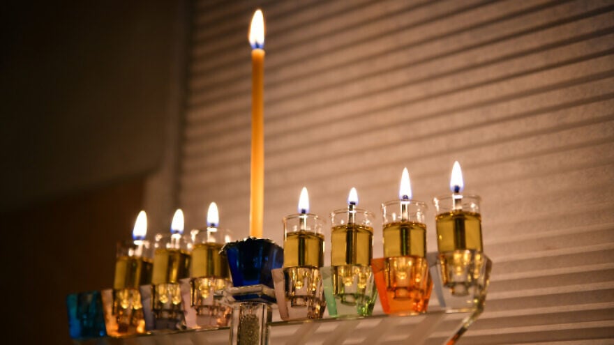 An illustration of a lit menorah in Jerusalem during the Jewish holiday of Chanukah, Dec. 16, 2020. Photo by Mendy Hechtman/Flash90.