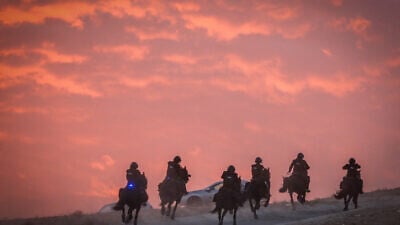 Israeli police clash with Bedouins during a protest against tree planting by the Jewish National Fund, outside the Bedouin village of al-Atrash in the Negev desert, Jan. 13, 2022. Photo by Jamal Awad/Flash90.
