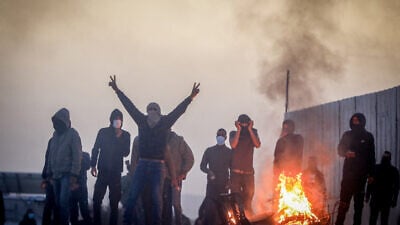 Bedouin riot over tree-planting by the Jewish National Fund outside the village of al-Atrash in the Negev Desert on Jan. 13, 2022. Photo by Jamal Awad/Flash90.