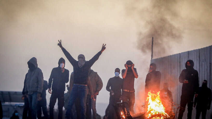 Bedouin riot over tree-planting by the Jewish National Fund outside the village of al-Atrash in the Negev Desert on Jan. 13, 2022. Photo by Jamal Awad/Flash90.