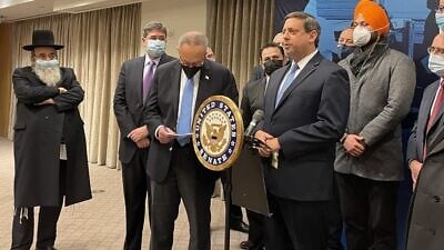 Nathan Diament, the Orthodox Union's executive director of public policy, speaks alongside Senate Majority Leader Chuck Schumer at a New York City press conference calling for an increase in funding for the Nonprofit Security Grant Program to $360 million, so more synagogues, other houses of worship and nonprofits at risk of attack can improve building security, Jan. 26, 2022. Credit: Orthodox Union.