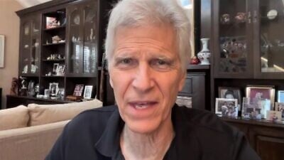 Mark Spitz at his Los Angeles home during a webinar where he received an award for his volunteer work with the Israel Guide Dog Center for the Blind, Photo by Howard Blas.