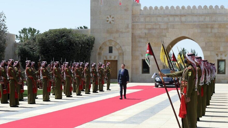 Israeli President Isaac Herzog is received by an honor guard in Amman, Jordan, March 30, 2022. Credit: Haim Zach/GPO.