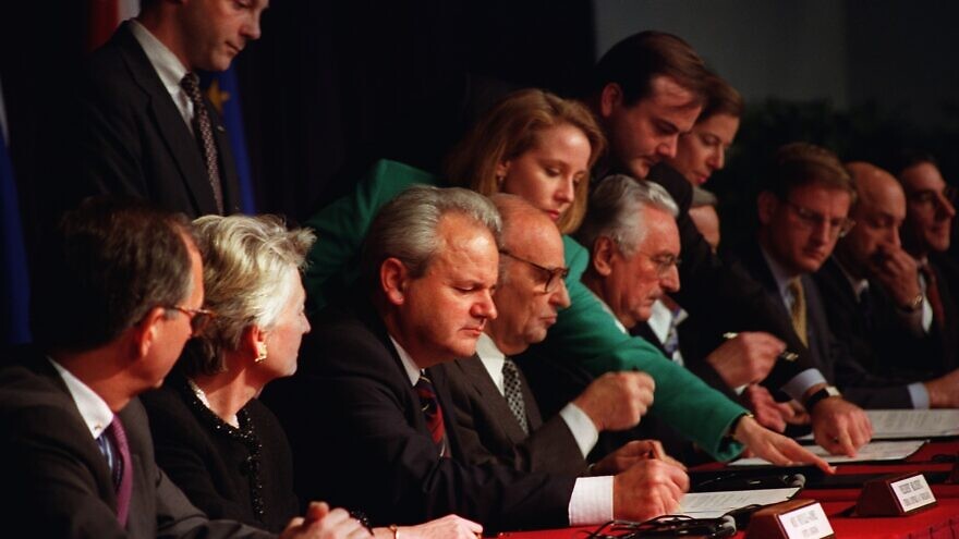 President Slobodan Milošević of the Federal Republic of Yugoslavia, President Alija Izetbegović of the Republic of Bosnia and Herzegovina, and President Franjo Tudjman of the Republic of Croatia initial the Dayton Peace Accords ending the conflict arising from the breakup of the Republic of Yugoslavia, Dec. 14, 1995. Credit: U.S. Air Force/Staff Sgt. Brian Schlumbohm via Wikimedia Commons.