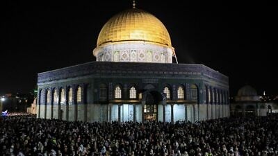 Tens of thousands of Muslim worshippers pray at the Al-Aqsa mosque compound on Qadr Night (Laylat al-Qadr) during the month of Ramadan in Jerusalem's Old City, April 27, 2022. Photo by Jamal Awad/Flash90.