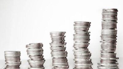 Stacked coins. Credit: Pixaby.