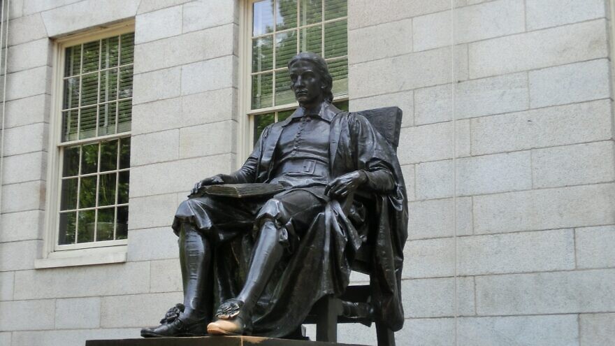 A statue of John Harvard at Harvard University in Cambridge, Mass. Credit: Pixabay.
