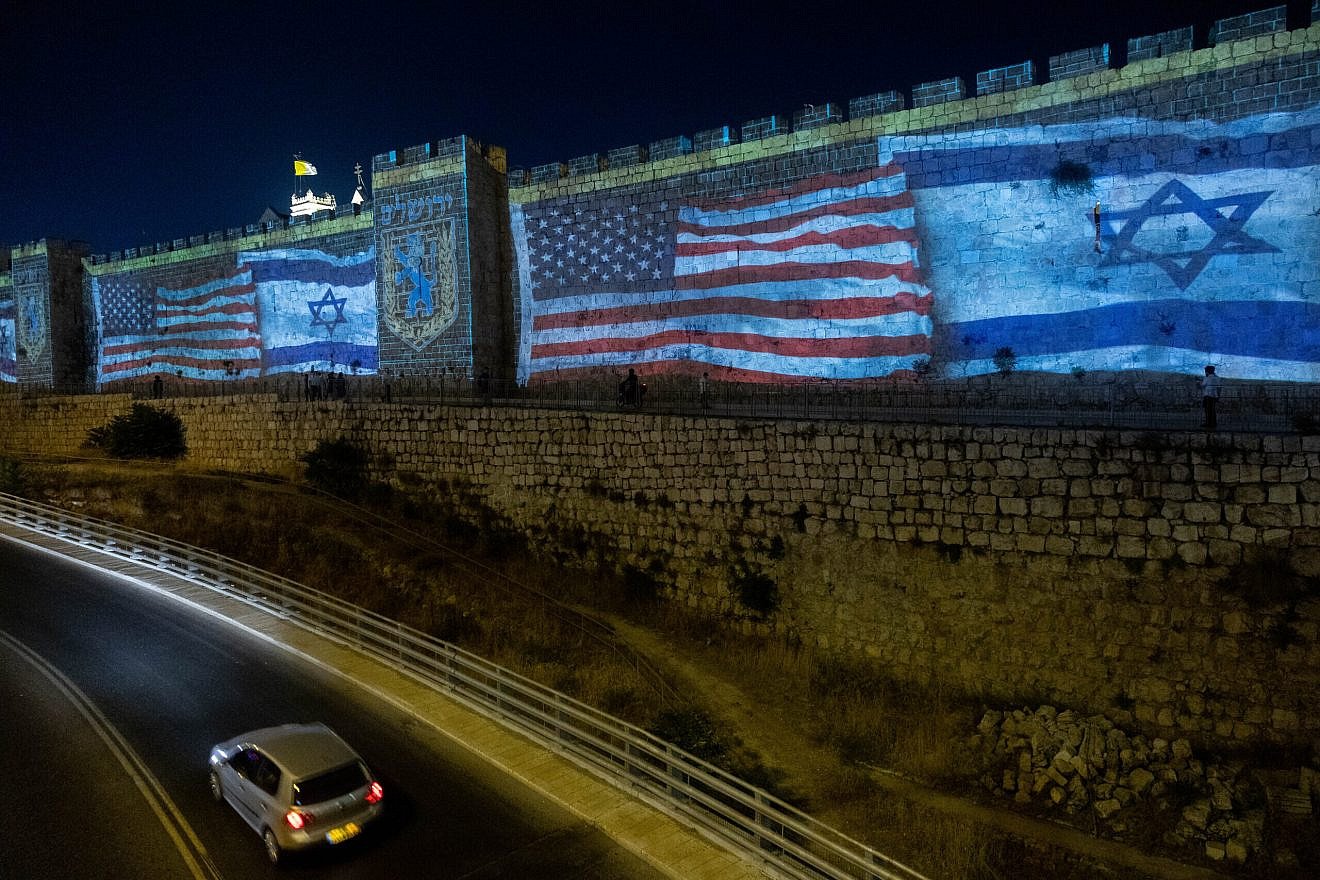 The American and Israeli flags are screened on the walls of Jerusalem's Old City as a welcome to U.S. President Joe Biden on July 13, 2022. Photo by Yonatan Sindel/Flash90.
