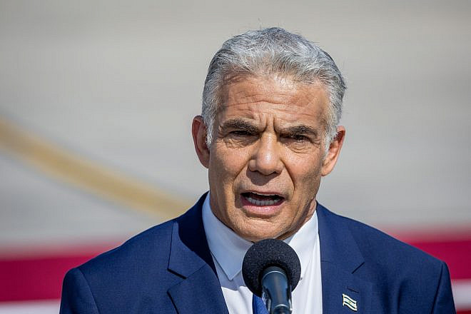 Israeli Prime Minister Yair Lapid gives a statement to the media after a farewell ceremony for U.S. President Joe Biden at Ben-Gurion International Airport near Tel Aviv on July 15, 2022. Photo by Yonatan Sindel/Flash90.