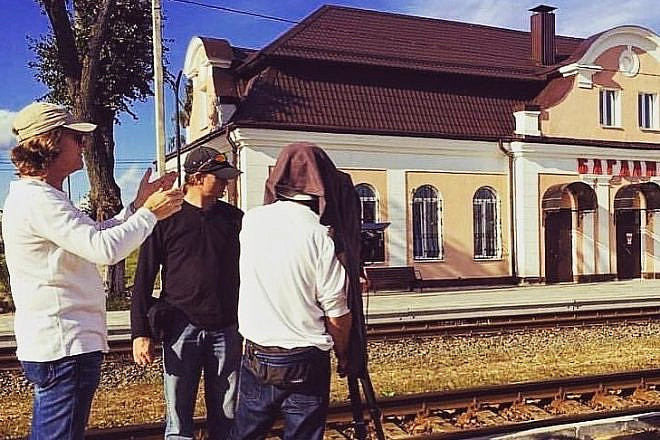 Award-winning documentary film director and writer Richard Trank in Eastern Europe with his crew on the set of “Never Stop Dreaming: The Life and Legacy of Shimon Peres” by Moriah Films, a division of the Simon Wiesenthal Center, to be released on Netflix on July 13, 2022. Credit: Moriah Films.