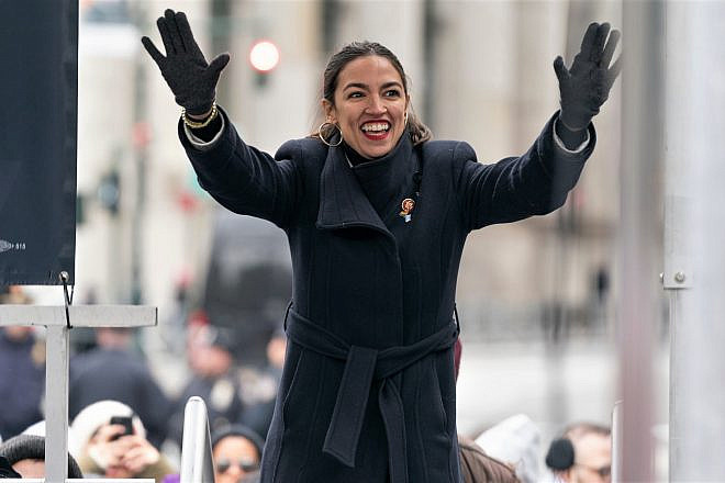 Rep. Alexandria Ocasio-Cortez (D-N.Y.) attends Women's Unity Rally in New York City on Jan. 19, 2019. Credit: Lev Radin/Shutterstock.