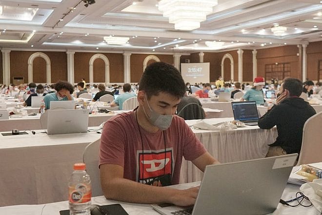 A high school student competes at the International Olympiad in Informatics in Yogyakarta, Indonesia, last month. Source: Facebook.