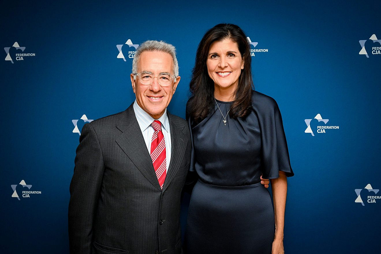 Former U.S. Ambassador Nikki Haley poses with Israeli-Canadian philanthropist Sylvan Adams in Montreal, Dec. 6, 2022. Credit: PBL Photography.
 ·