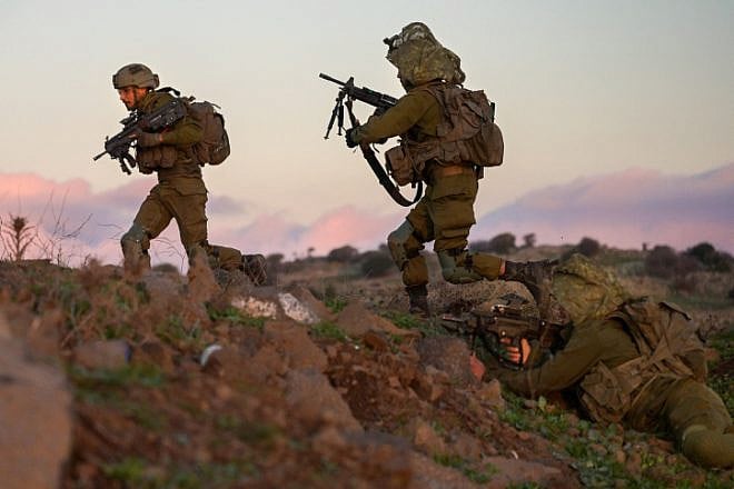 Soldiers from the IDF's Givati Brigade train near Kibbutz Merom Golan on the northern Golan Heights, Dec. 27, 2022. Photo by Michael Giladi/Flash90.
