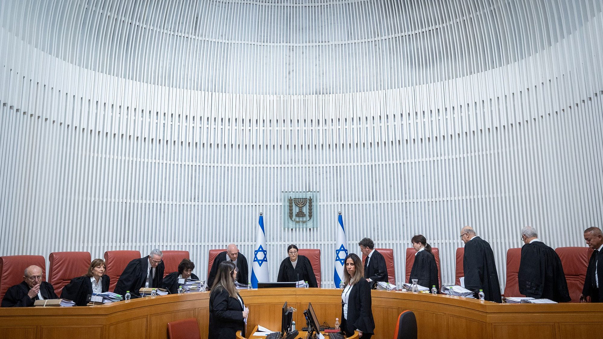 Israeli Supreme Court justices arrive for a hearing in Jerusalem on the appointment of Shas leader Aryeh Deri as a government minister, Jan. 5, 2023. Photo by Yonatan Sindel/Flash90.