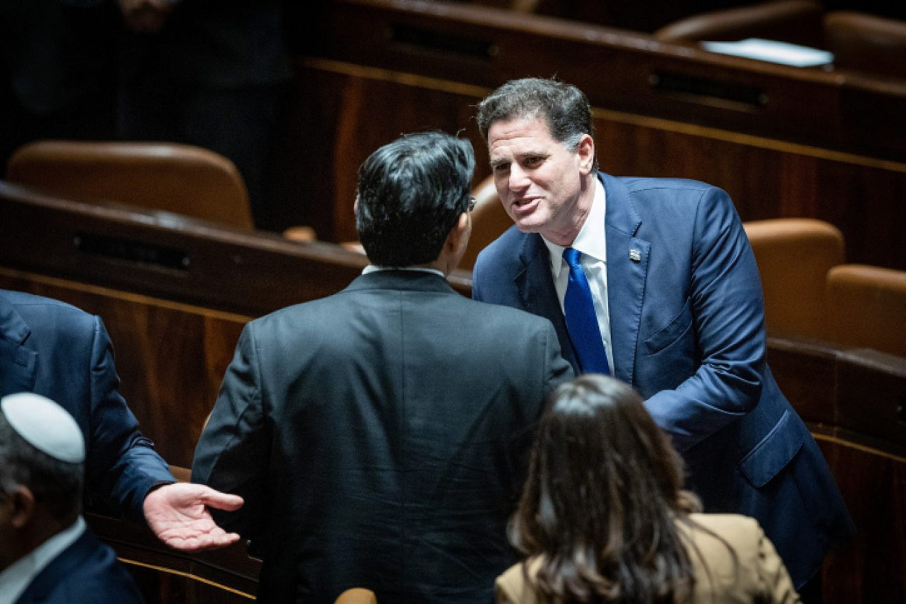 Minister of Strategic Affairs Ron Dermer with MK Danny Danon before the swearing-in of the government at the Knesset in Jerusalem, Dec. 29, 2022. Photo by Yonatan Sindel/Flash90.