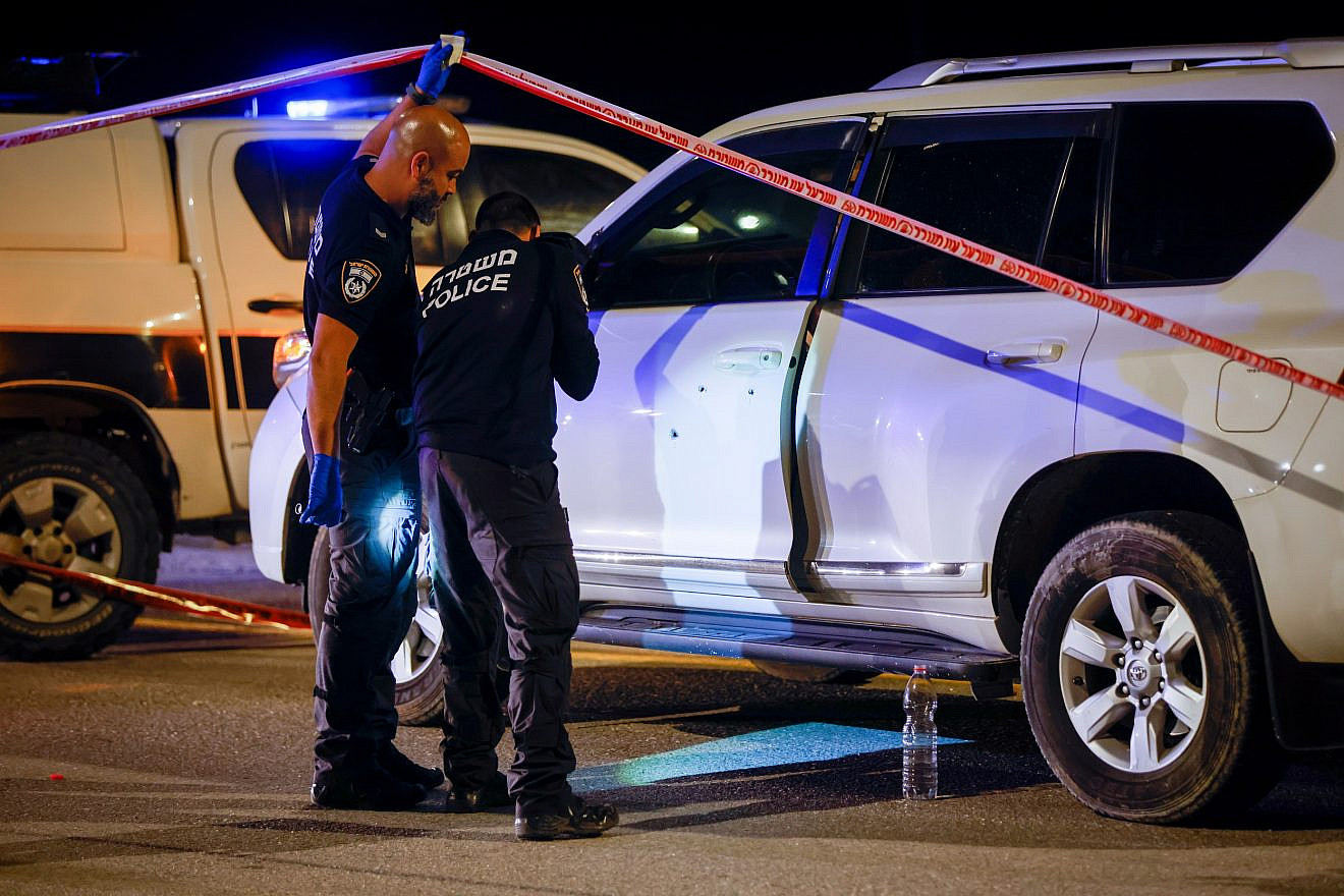Israeli security forces guard at the scene of a shooting attack in Bet Ha'Arava Junction in the Jordan Valley on Feb. 27, 2023. Photo by Erik Marmor/Flash90.