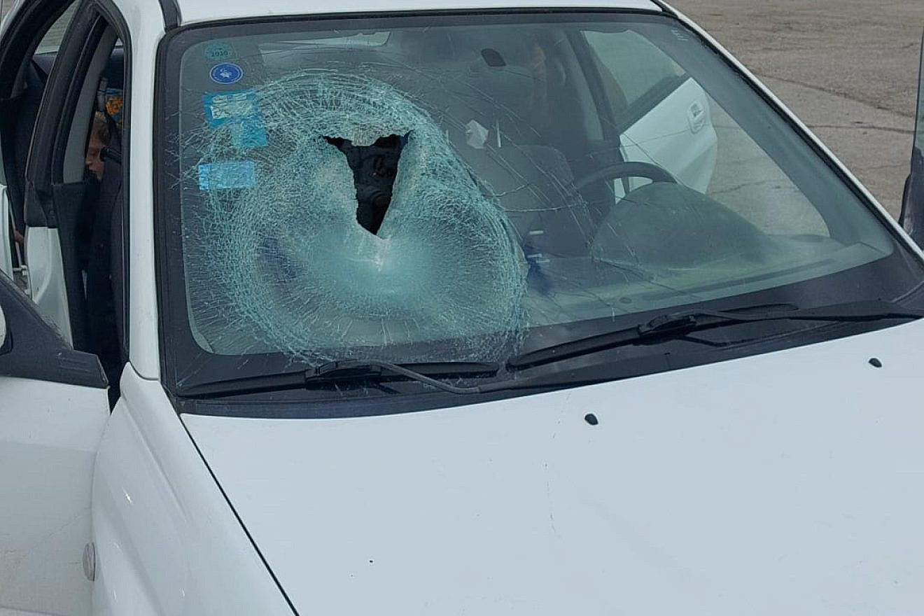 Three young children and their mother were attacked by Palestinian stone-throwers near the Tapuach Junction in Samaria, Feb. 23. 2023. Credit: Samaria Regional Council.