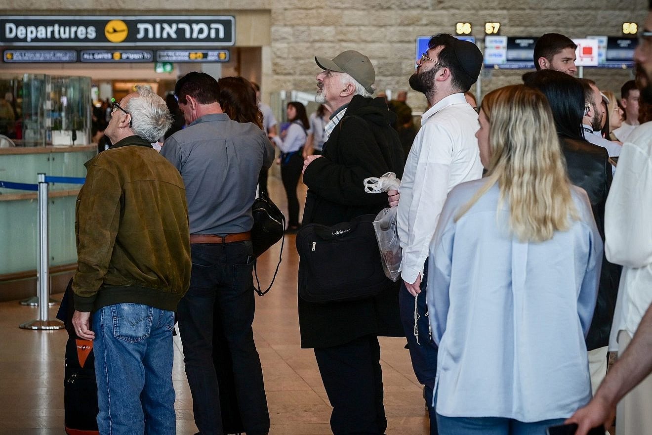 Travelers at Ben-Gurion International Airport, where flights were being delayed as the workers of the airport went on strike in a protest against the judicial overhaul proposed by the government on March 27, 2023. Photo by Avshalom Sassoni/Flash90.