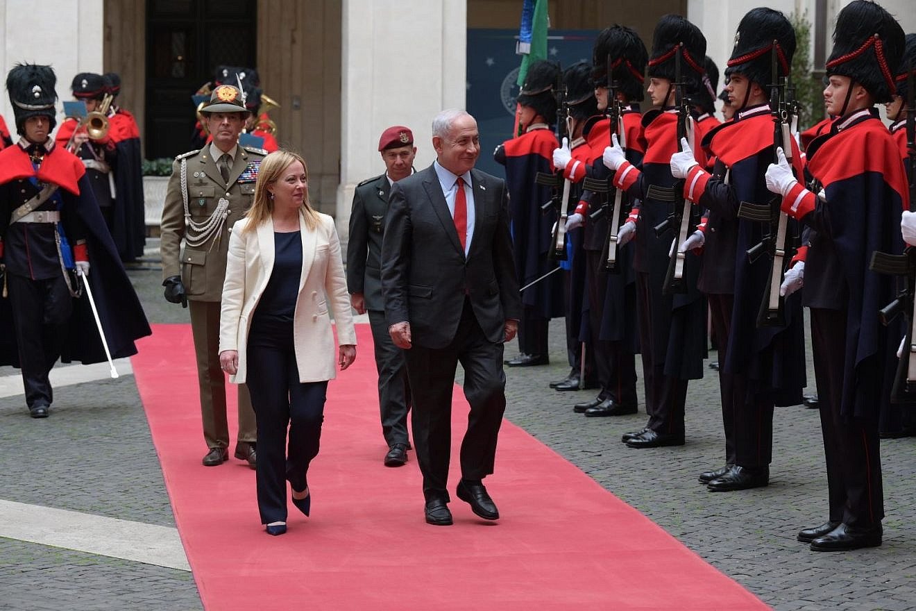 Israeli Prime Minister Benjamin Netanyahu is welcomed by an honor guard as he meets with Italian Prime Minister Giorgia Meloni at the Chigi Palace in Rome, Italy, on March 10, 2023. Credit: Amos Ben-Gershom/GPO.