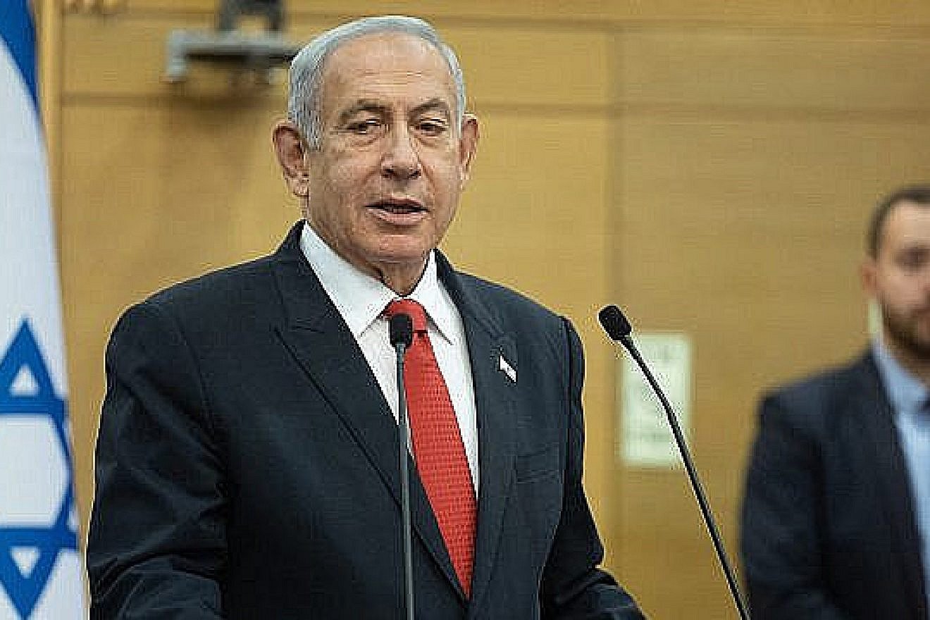 Israeli Prime Minister Benjamin Netanyahu leads a faction meeting at the Knesset, Feb. 20, 2023. Photo by Yonatan Sindel/Flash90.