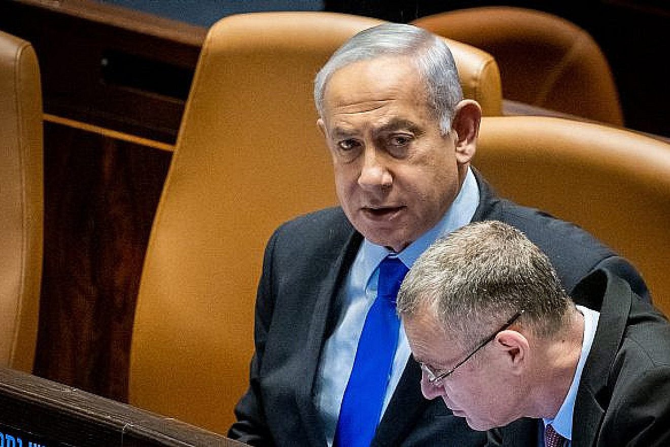 Israeli Prime Minister Benjamin Netanyahu with Justice Minister Yariv Levin at the Knesset, March 6, 2023. Photo by Yonatan Sindel/Flash90.