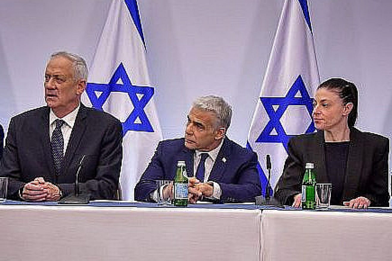 From left: Opposition party leaders Benny Gantz of National Unity, Yair Lapid of Yesh Atid and Merav Michaeli of Labor at a joint press conference in Tel Aviv on judicial reform, March 16, 2023. Photo by Avshalom Sassoni/Flash90.