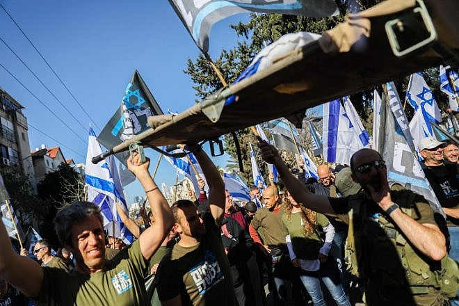 Israeli reservists and activists protest against the Israeli government's planned judicial reform, in the city of Bnei Brak, March 16, 2023. Photo by Flash90.