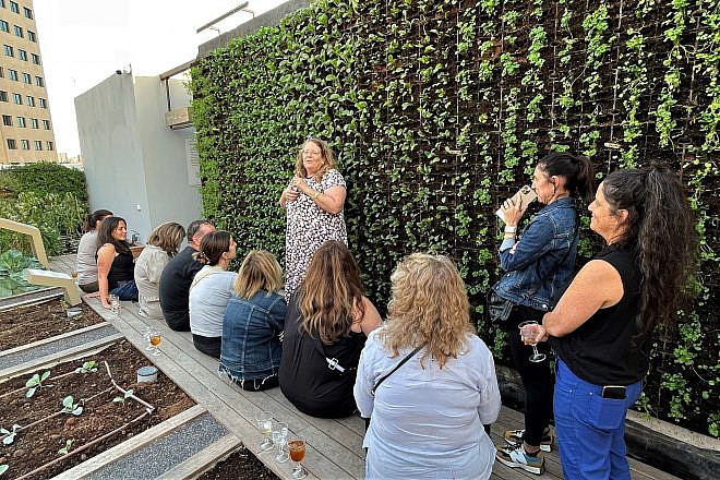 Cookbook author Adeena Sussman speaks to a Via Sabra tour group in Israel. Photo by Eliana Rudee.