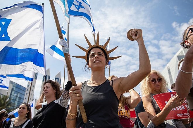 Israelis protest against the Israeli government's planned judicial overhaul, in Haifa, March 27, 2023. Photo by Shir Torem/Flash90.