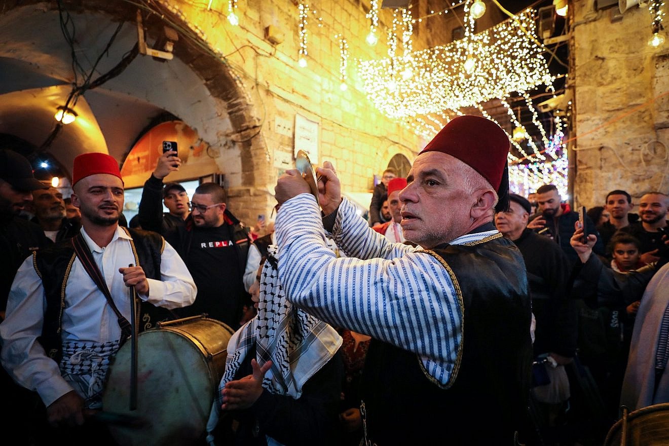 Palestinian Arabs celebrate the first night of the holy month of Ramadan in Jerusalem's Old City on March 23, 2023. Photo by Jamal Awad/Flash90.