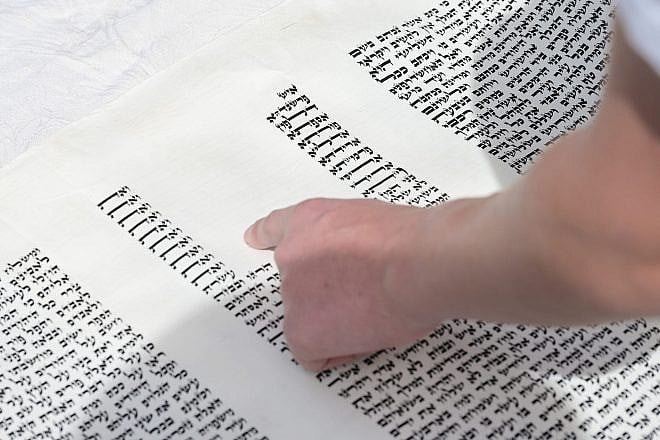 Jews, some of them new immigrants, read the Megillat Esther (the Scroll of Esther) during the Jewish holiday of Purim in Katzrin in northern Israel on March 7, 2023. Photo by Michael Giladi/Flash90.