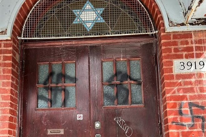 Swastikas on the front doors and adjacent brick facade of the Bagg Street Shul in Montreal, Canada, March 2023. Source: Twitter/Michal Cotler-Wunsch.