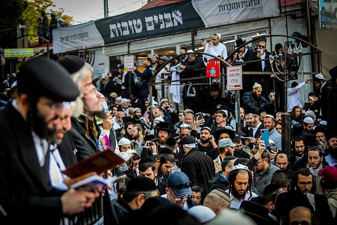 Jewish men in the street near the tomb of Reb Nachman of Breslov in Uman on eve of Rosh Hashanah, Sept. 25, 2022. Credit: Flash90.