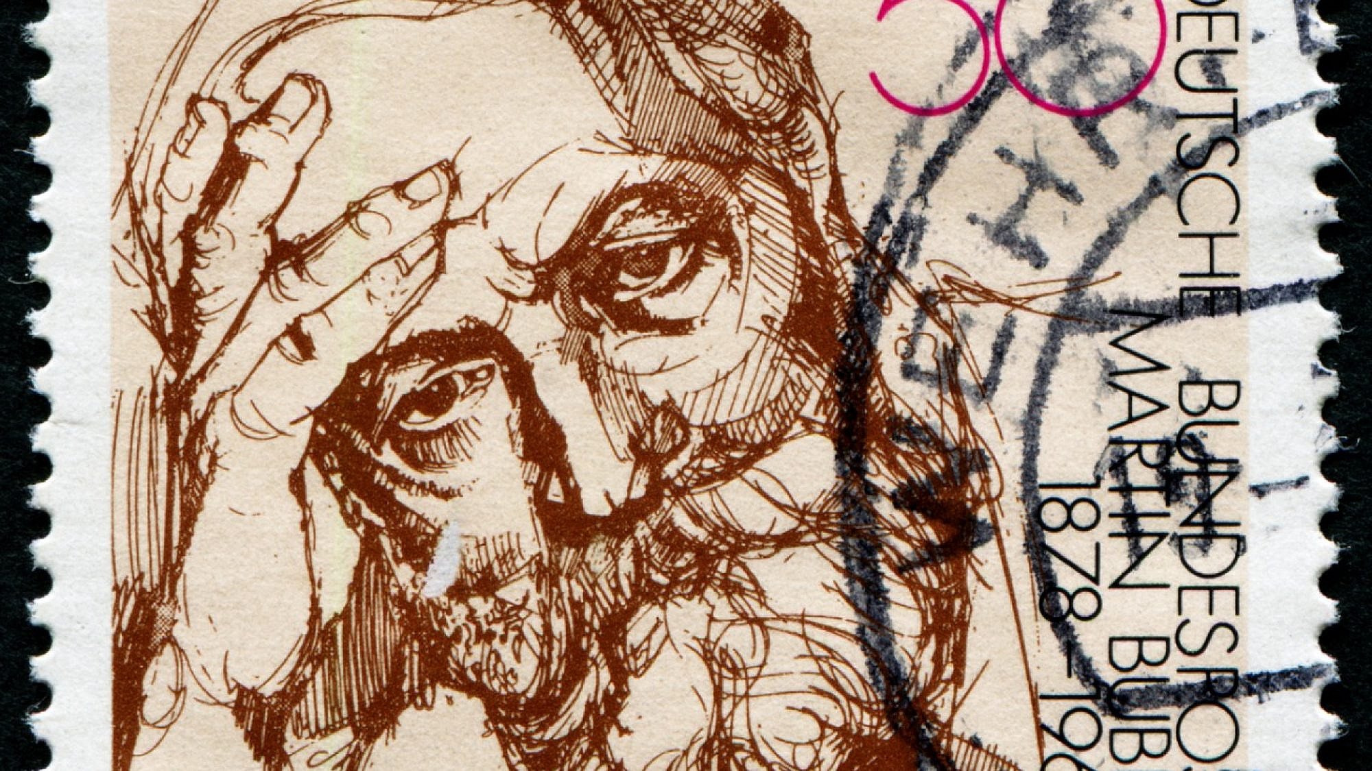 A stamp printed in Germany shows portrait Martin Buber, circa 1978. Credit: Galyamin Sergej/Shutterstock.
