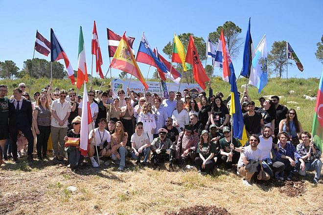 Eurovision Song Contest 2013 participants plant saplings in the KKL Eurovision Forest, located within the Ben Shemen Forest, April 3, 2023. Photo by Shachar Cohen.