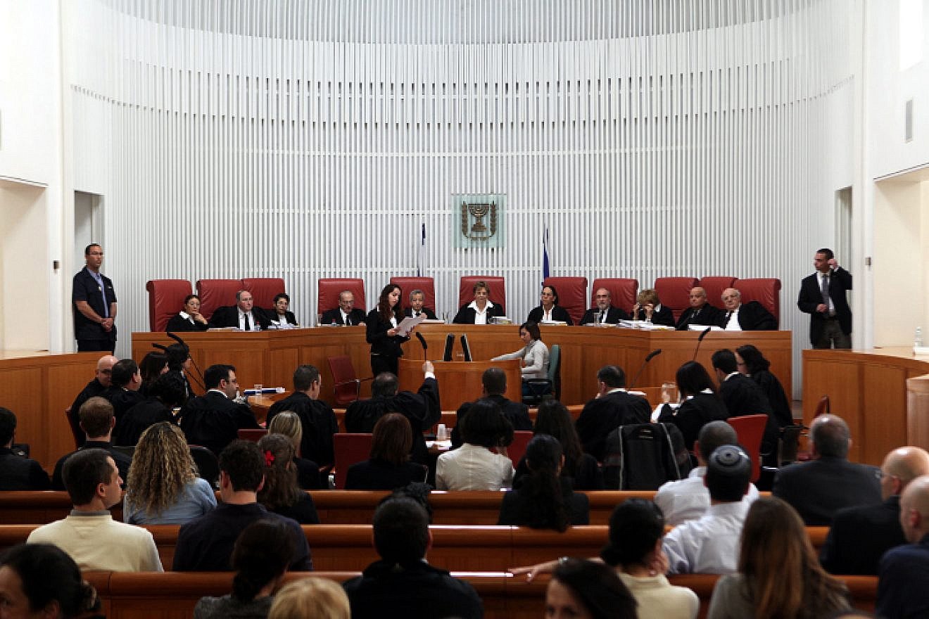 Eleven Israeli Supreme Court Justices deliberate on a petition related to Palestinian Arabs submitted by HaMoked, among other NGOs. Photo by Yossi Zamir/Flash 90.