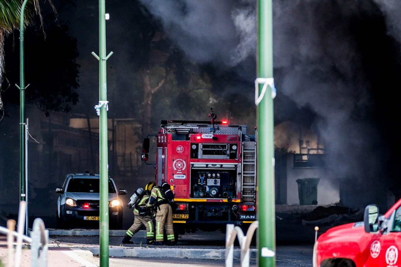 Firefighters try to extinguish a fire in the Israeli town of Shlomi caused by a rocket launched from Lebanon, April 6, 2023. Photo by Fadi Amun/Flash90.