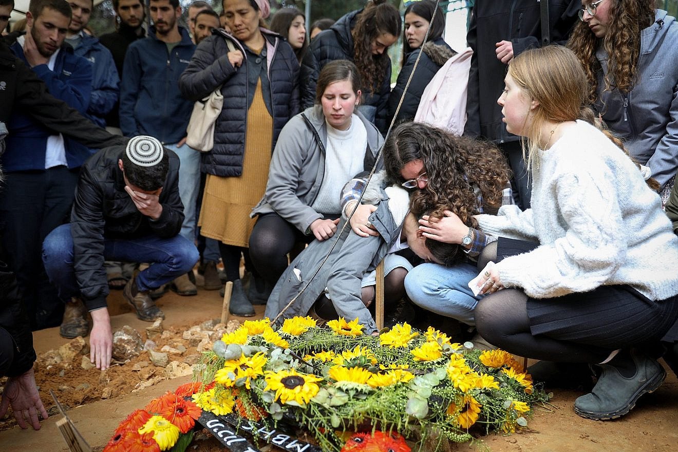 Family and friends attend the funeral of Lucy Dee, 48, just days after two of her daughters were buried, at the Gush Etzion Regional Cemetery in Kfar Etzion on April 11, 2023. Photo by Noam Revkin Fenton/Flash90.