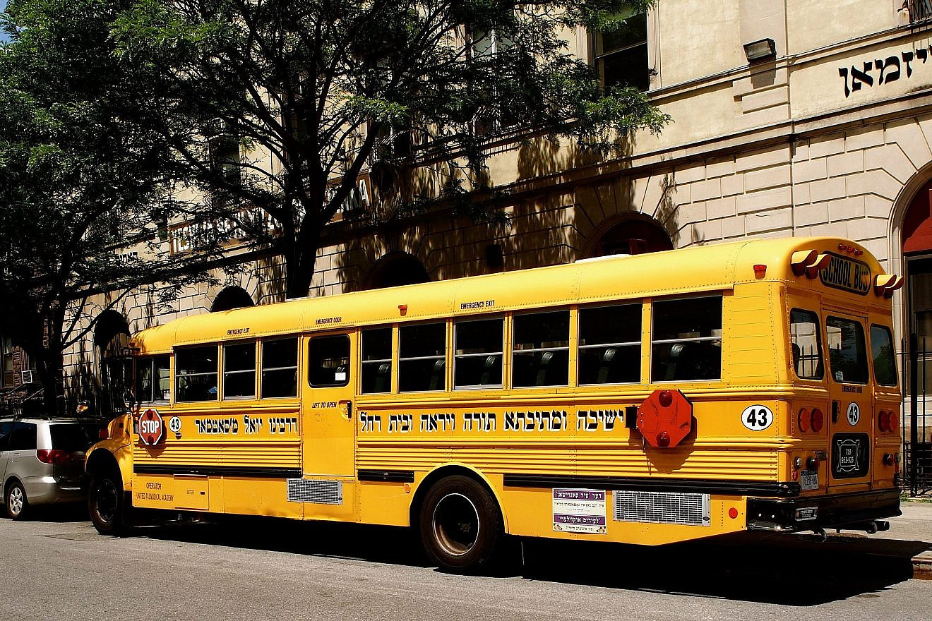 Bus with Hebrew lettering in Williamsburg in New York. Credit: alexat25/Shutterstock.