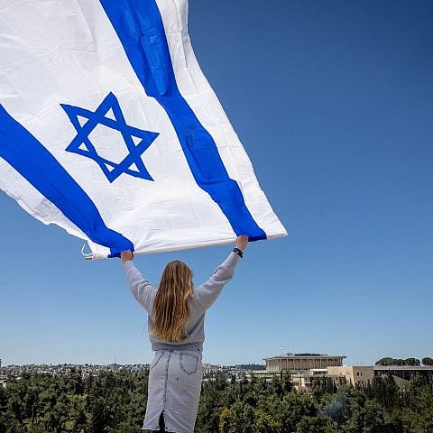 Watching the military airshow as part of Israel's 75th Independence Day celebrations in Jerusalem on April 26, 2023. Photo by Yonatan Sindel/Flash90. Watching the military airshow as part of Israel's 75th Independence Day celebrations in Jerusalem on April 26, 2023. Photo by Yonatan Sindel/Flash90.